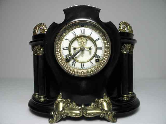 Appraisal: Ansonia Clock Co black lacquer skeleton mantle clock Metal housing