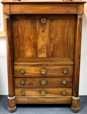 Appraisal: A Regency mahogany escritoire with pillars to the sides having