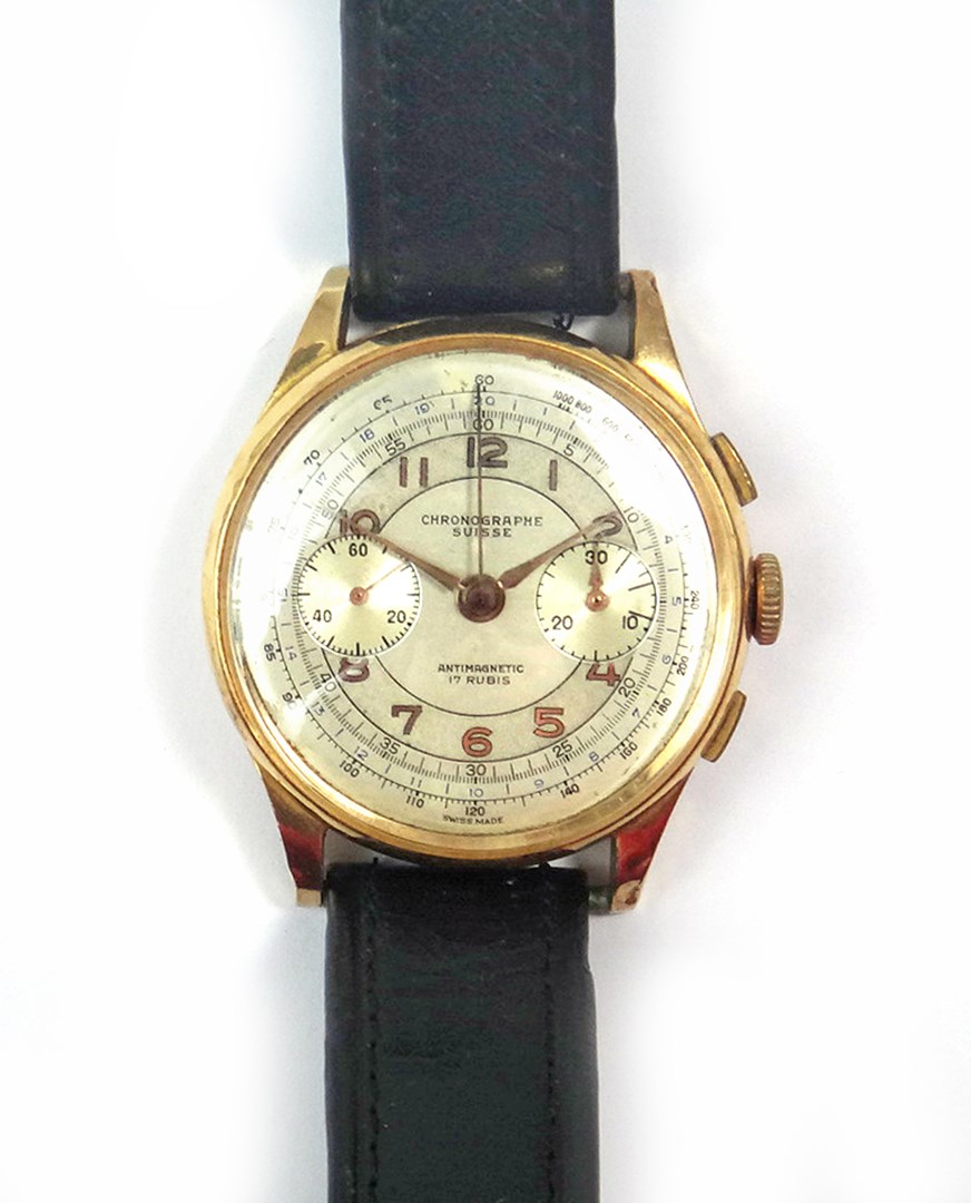 Appraisal: A gentleman's gold cased chronograph wristwatch the silvered dial with