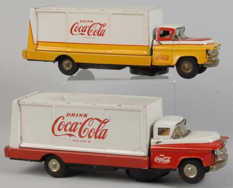 Appraisal: Lot of Coca-Cola Toy Trucks Description s Both are battery-operated