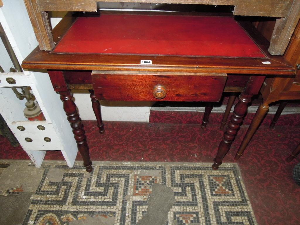 Appraisal: A mahogany side table with inset leather top over a