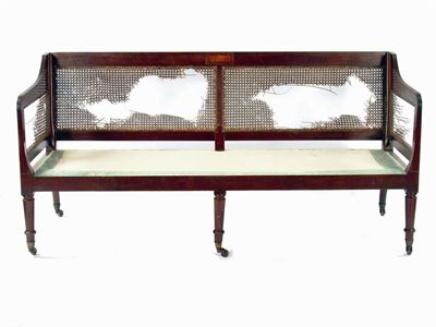 Appraisal: A late Regency mahogany settee with a reeded frame and