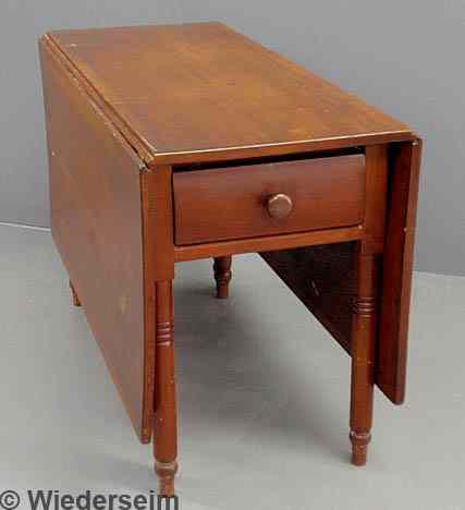 Appraisal: Pennsylvania Sheraton cherry drop-leaf table c with a single drawer