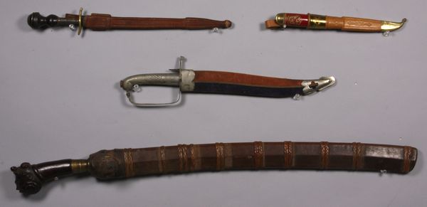 Appraisal: Group of four blade weapons including one Phillipine Machete with