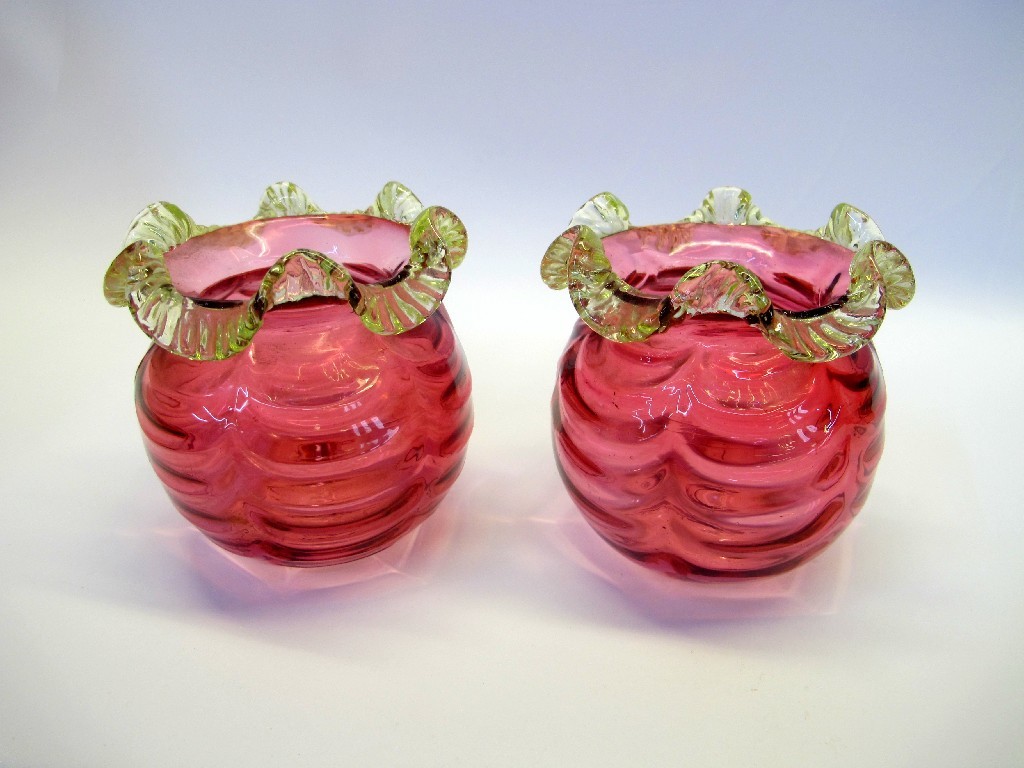 Appraisal: Pair of cranberry glass posy pots with lemon tinted frilled