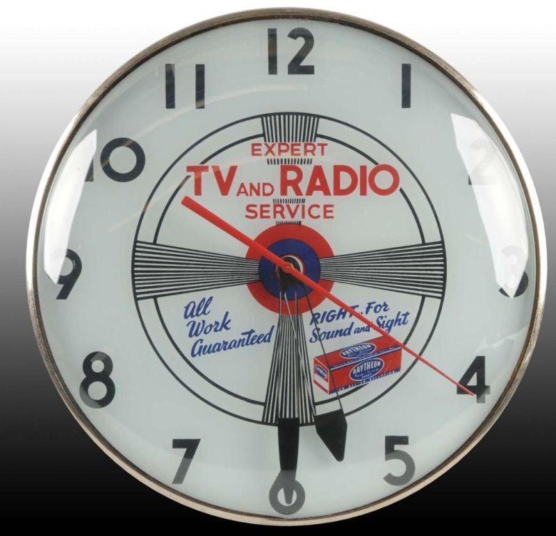 Appraisal: Raytheon TV Radio Service Electric Clock Description Light-up clock Lights