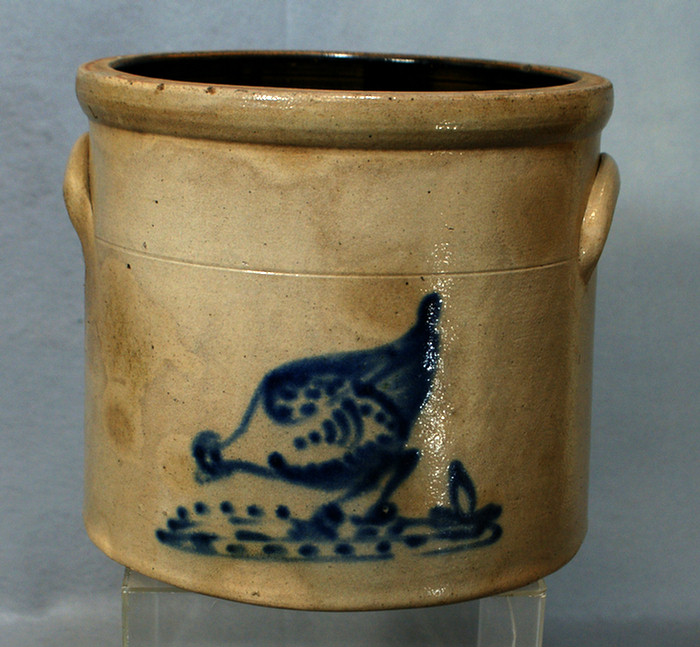 Appraisal: Stonware jar with feeding chicken blue decoration no chips or