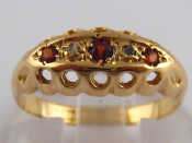 Appraisal: An carat gold garnet and diamond ring hallmarked Birmingham size