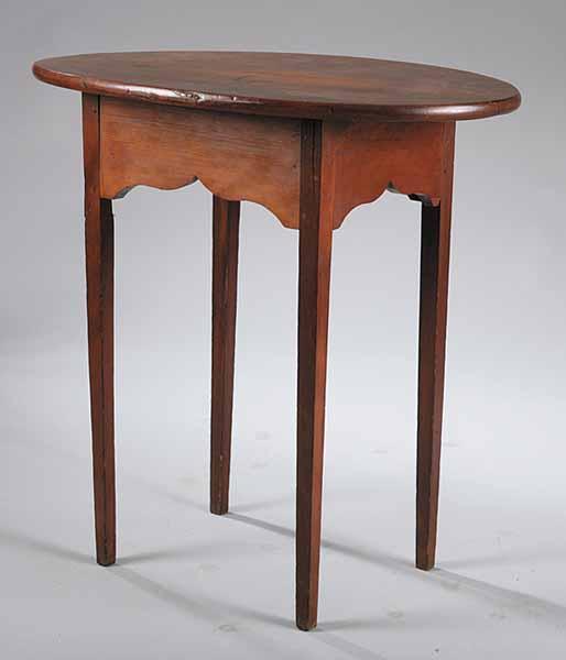 Appraisal: An American Cherrywood Oval Top Tavern Table composed of antique