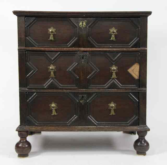 Appraisal: A th Century oak chest fitted three drawers with geometric