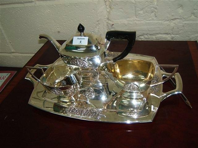 Appraisal: A Thai sterling silver tea set decorated with Oriental figures