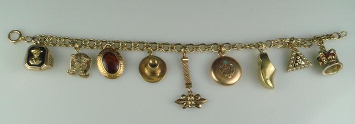 Appraisal: K YG bracelet with K K YG charms others total