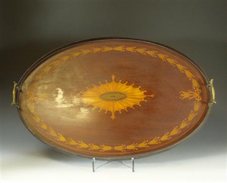 Appraisal: An Edwardian mahogany and marquetry tea tray of oval from