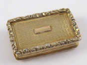 Appraisal: A Georgian silver gilt vinaigrette with reeded sides engine turned