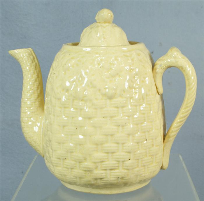 Appraisal: Embossed yellowware coffee pot with basketweave and acorn design h