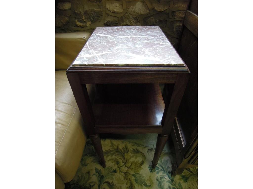 Appraisal: A mahogany two tier bedside occasional table of rectangular form