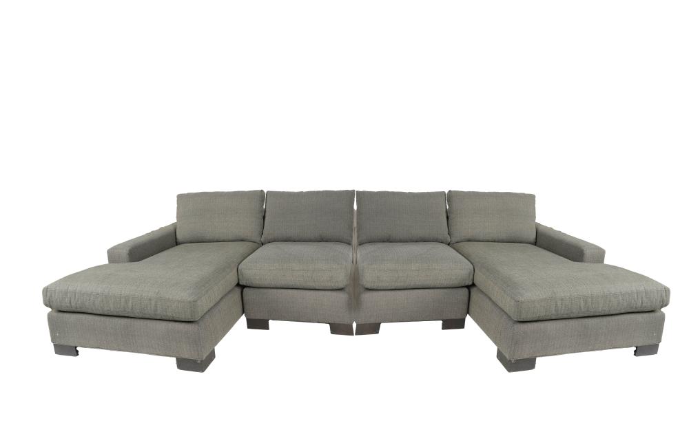 Appraisal: CONTEMPORARY GREY UPHOLSTERED SOFAin four parts smaller section inches wide