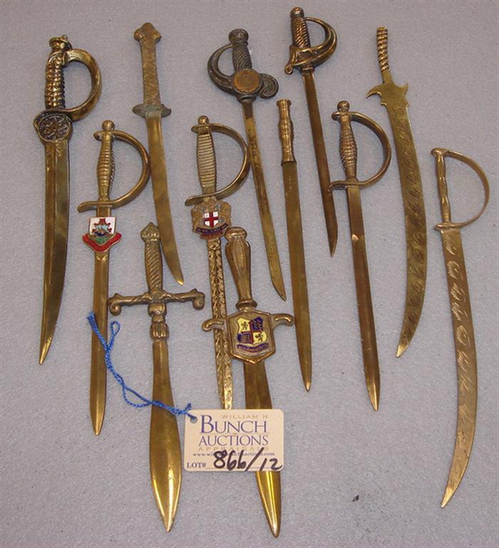 Appraisal: Lot of vintage brass sword shaped souvenir letter openers Including