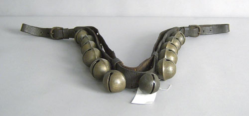 Appraisal: Leather strap of brass sleigh bells th c