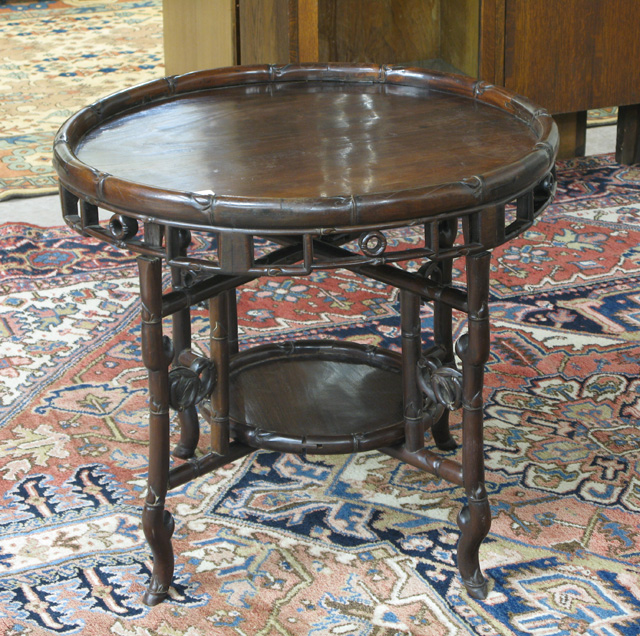 Appraisal: ROUND ROSEWOOD TEA TABLE Chinese th century the round tray-like