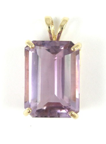 Appraisal: AMETHYST AND FOURTEEN KARAT GOLD PENDANT with four yellow gold