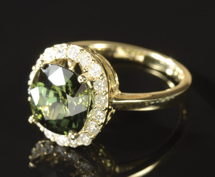 Appraisal: GREEN TOURMALINE AND DIAMOND RING k yellow gold with round-cut