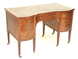 Appraisal: A mahogany desk th century the leather inset top above