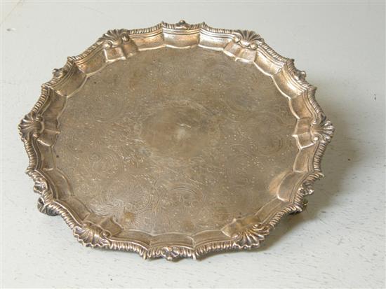 Appraisal: George II round silver slaver with raised shell embossed border