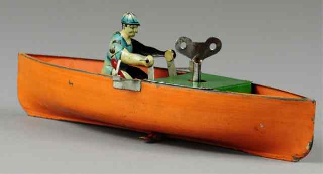 Appraisal: MAN IN ROWBOAT TOY Arnold Germany lithographed tin rower sits