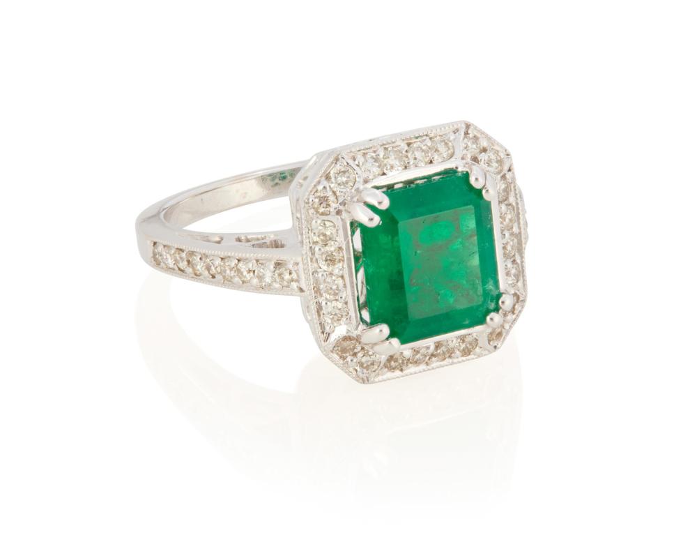 Appraisal: AN EMERALD AND DIAMOND RINGAn emerald and diamond ring k