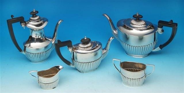 Appraisal: A SILVER AND SILVER PLATED FIVE PIECE TEASET to include