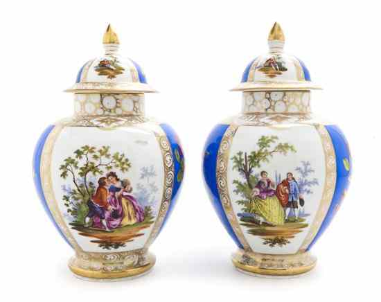 Appraisal: A Pair of Dresden Porcelain Covered Urns each of ovoid