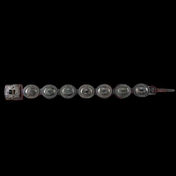 Appraisal: Navajo Second Phase Concha Belt with seven conchas decorated with