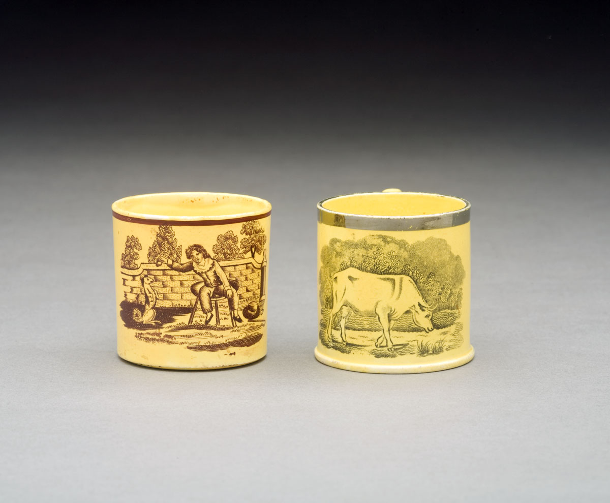 Appraisal: TWO ENGLISH YELLOW-GLAZED TRANSFER-PRINTED CHILDREN'S MUGS CIRCA - The first