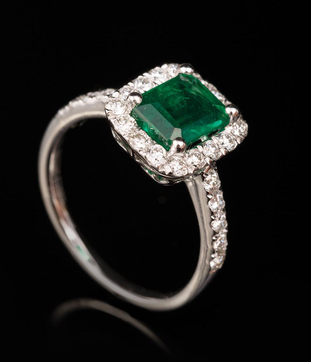 Appraisal: Platinum Emerald and Diamond Ring center prong set emerald cut