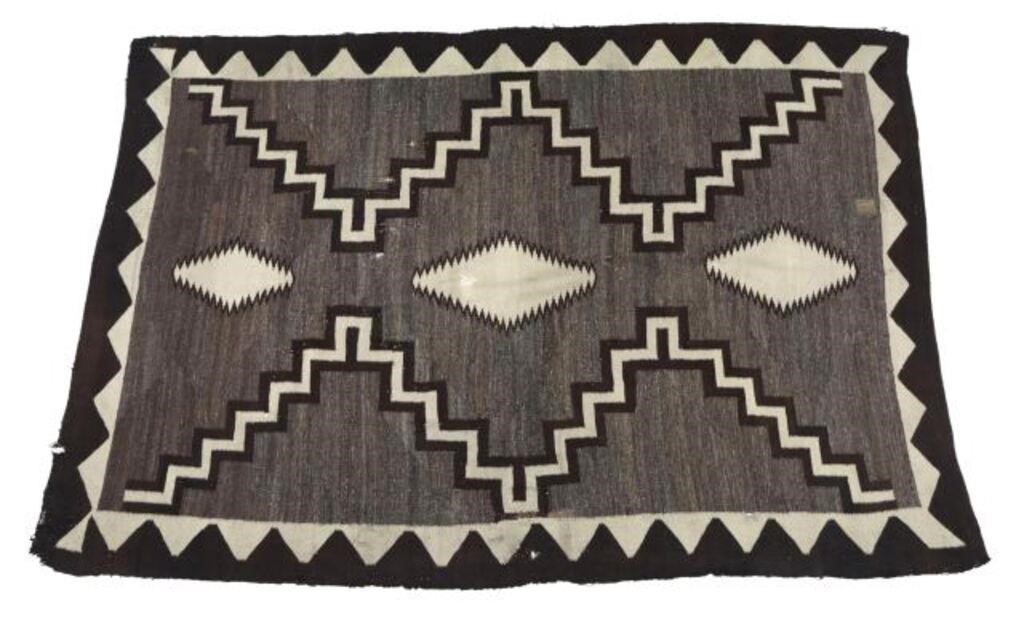 Appraisal: Native American Navajo woven wool rug with central diamond pattern