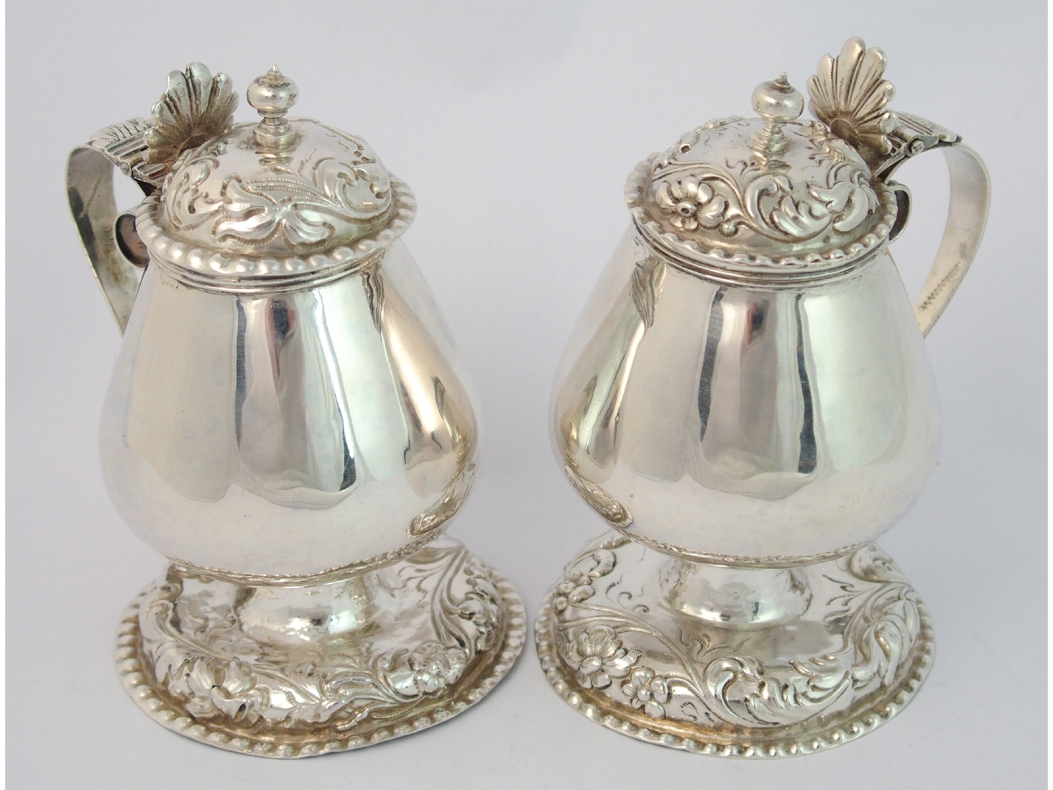 Appraisal: A pair of continental white metal cups and coversone bearing