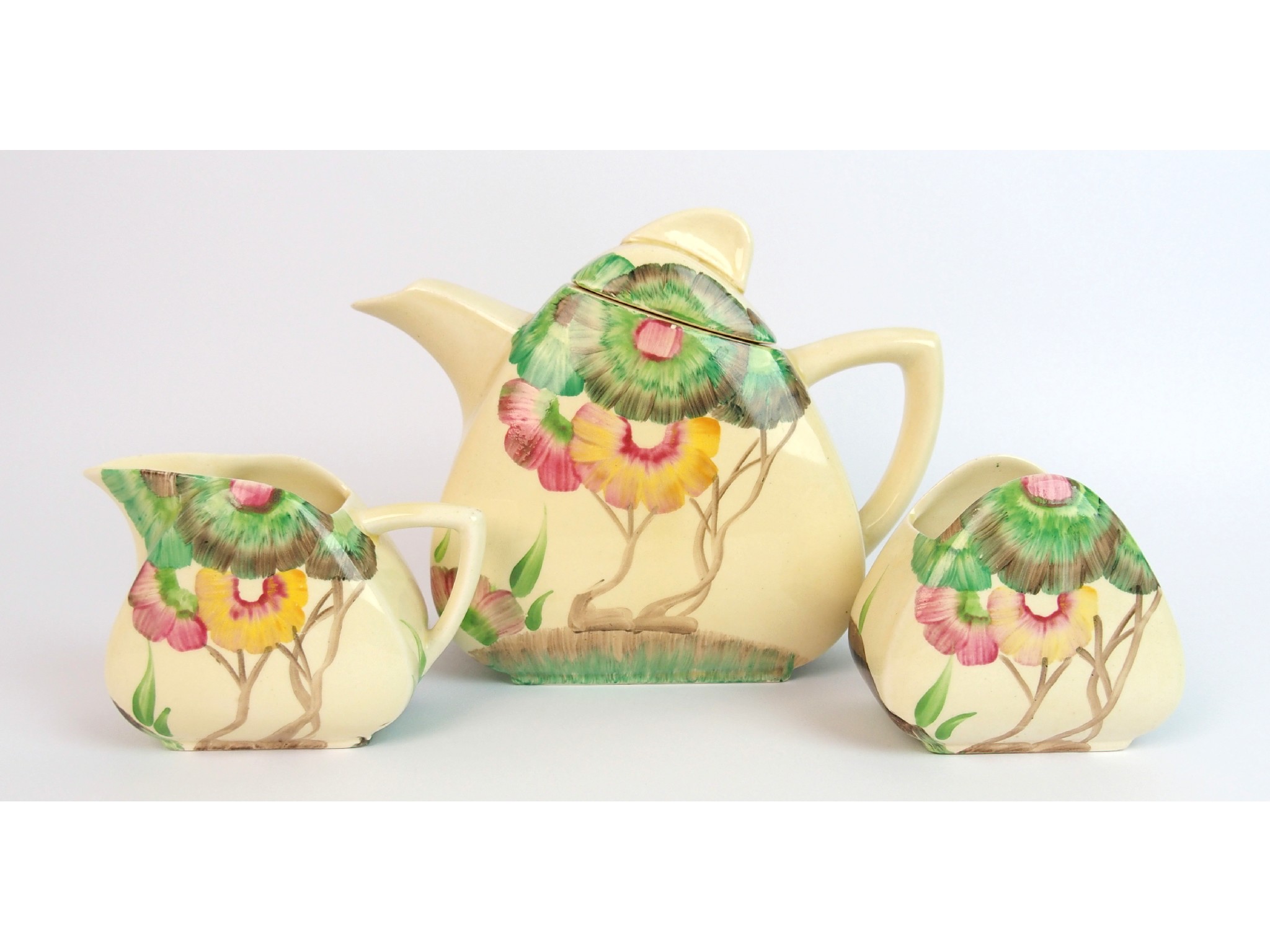 Appraisal: A Clarice Cliff Bizarre 'Aurea' pattern Trieste three-piece tea servicecirca