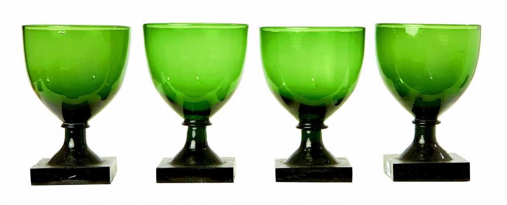 Appraisal: A RARE SET OF FOUR LATE GEORGIAN BRISTOL GREEN GLASS