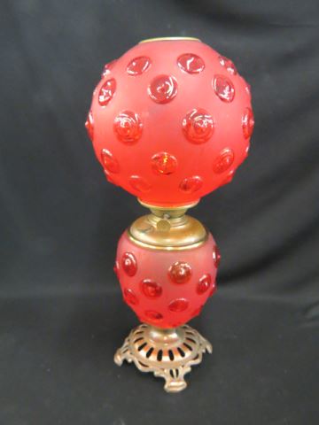 Appraisal: Victorian Banquet Oil Lamp red satin with raised buttons Success