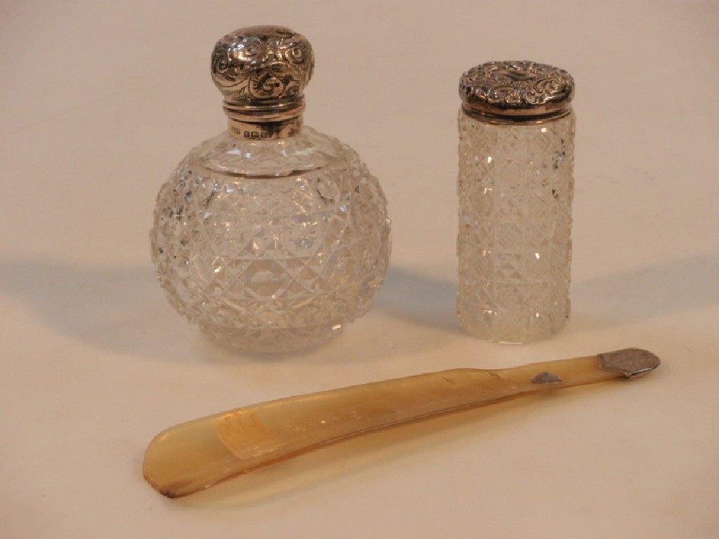 Appraisal: An Edward VII cut glass spherical scent bottle with an