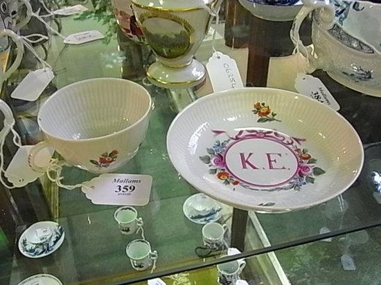 Appraisal: A PORCELAIN CUP AND SAUCER in the Longton Hall style