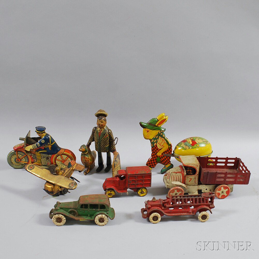 Appraisal: Five Tin Lithograph Toys and Three Painted Cast Iron Toys