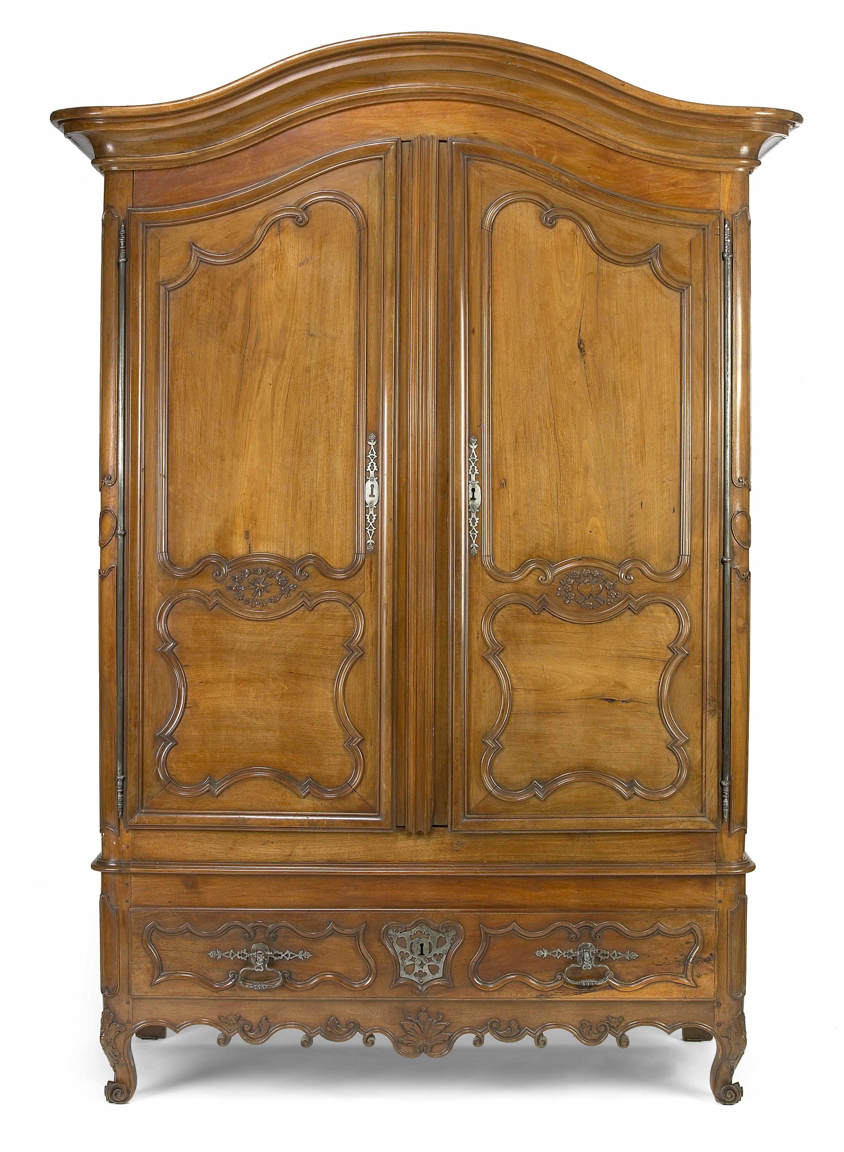 Appraisal: A Louis XV walnut armoire third quarter th century The