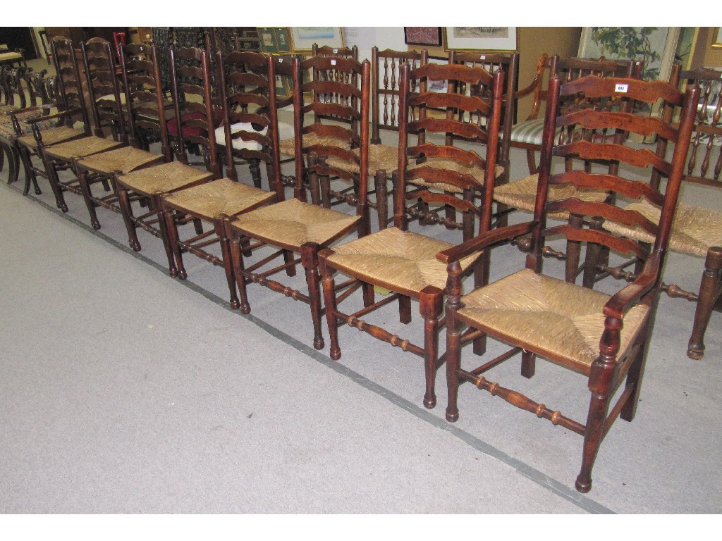 Appraisal: Set of eight wavy ladderback dining chairs