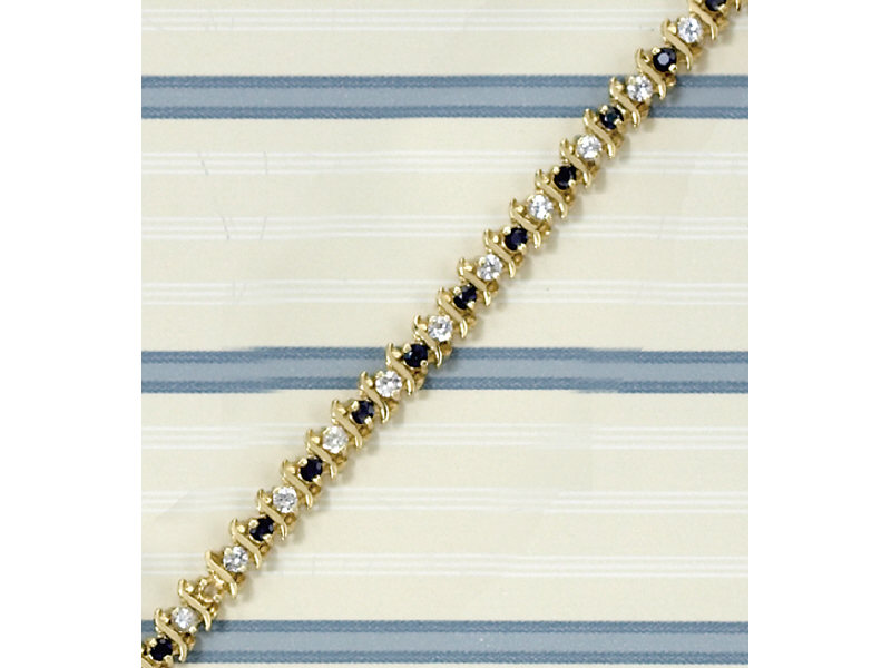 Appraisal: SAPPHIRE BRACELET k yellow gold S link bracelet set with