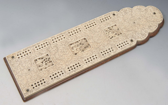 Appraisal: A CHINESE CANTON CARVED IVORY CRIB BOARD with three reserve