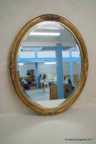 Appraisal: Gold Guilt Wood Framed Beveled Glass Wall MirrorIs a very