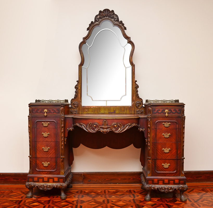 Appraisal: ORNATE 'S VANITY WITH MIRROR Carved and shaped central mirror