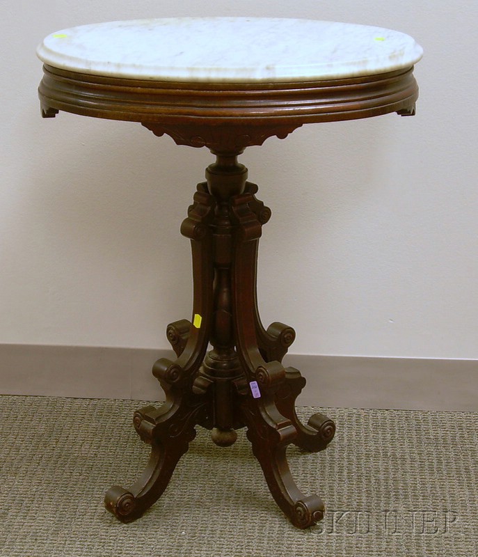 Appraisal: Victorian Oval Marble-top Carved Walnut Stand